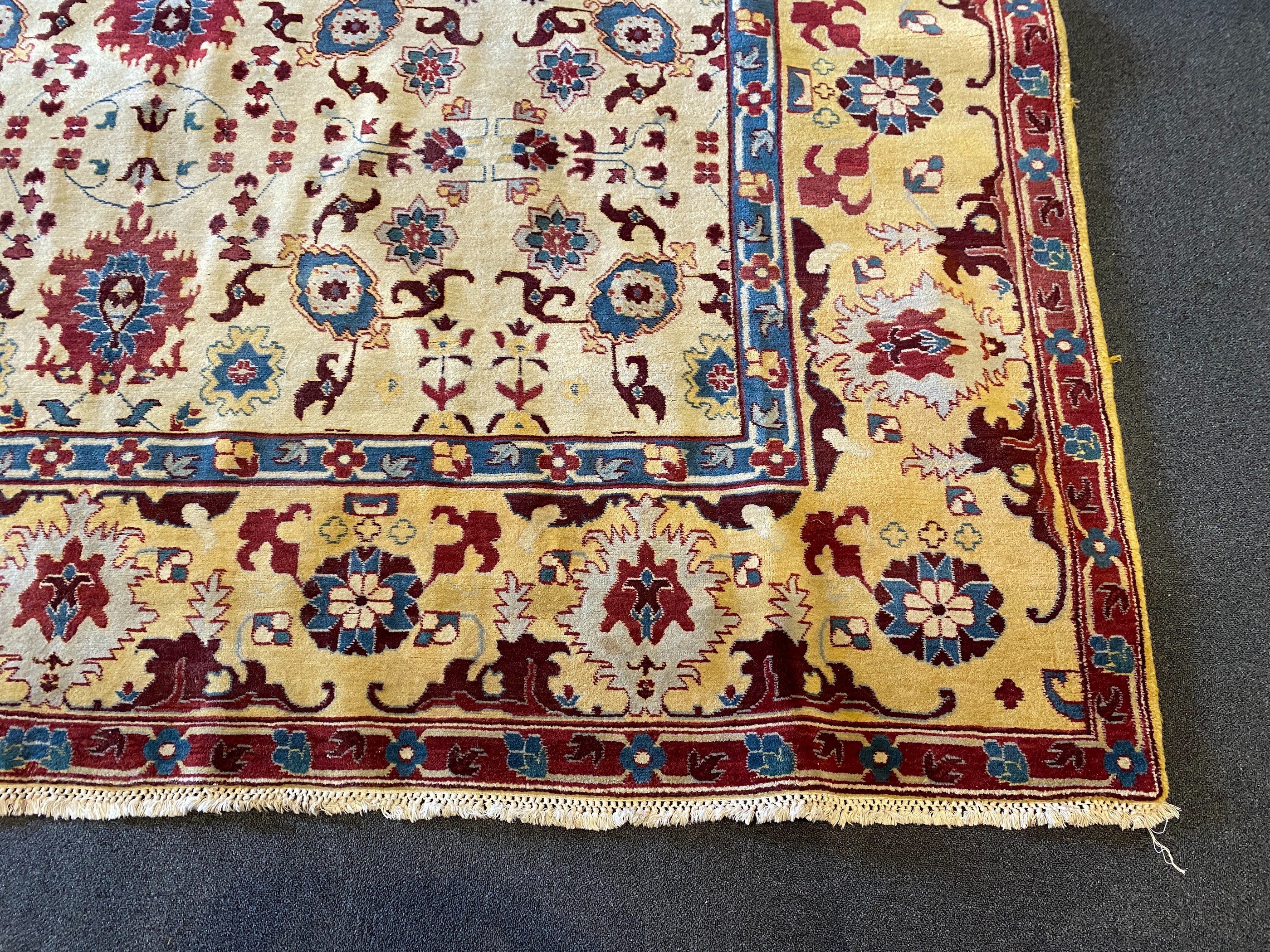 An Agra ivory ground carpet, 360 x 274cm